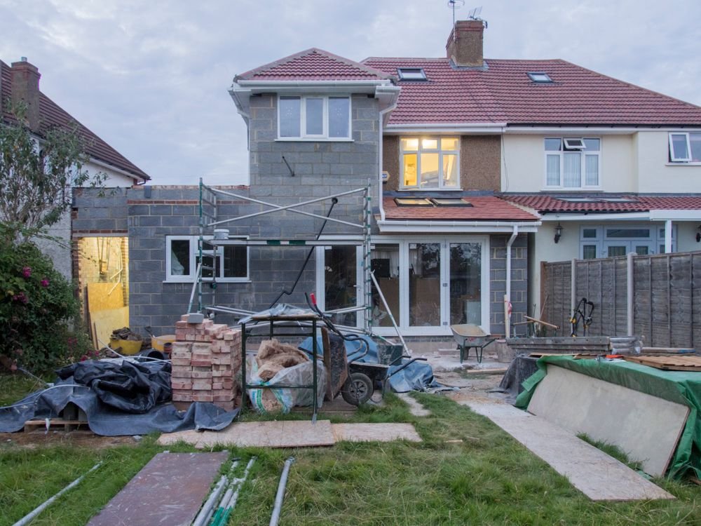 Home extension under construction in Aldershot during summer
